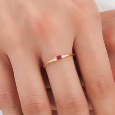 About this item Introducing the exquisite Baguette Ruby Ring in Real Gold, designed to captivate with its stunning allure and timeless elegance. Crafted with utmost precision, this exquisite piece is perfect for those seeking a symbol of eternal love and commitment 𝐈𝐭𝐞𝐦 𝐃𝐞𝐭𝐚𝐢𝐥𝐬 * Gold KT: 10K, 14K, 18K * Custom Gold Color: Rose Gold, Yellow Gold, White Gold * Width of Band: 3.00MM * Thickness of Band: 1.45MM 𝐆𝐞𝐦𝐬𝐭𝐨𝐧𝐞 𝐃𝐞𝐭𝐚𝐢𝐥𝐬 * Ruby * Total CTW: 0.56ctw WHY COSMIC FINE JEWELRY? ✓ Crafted with precision by skilled artisans with 10 years of experience in fine jewelry craftsmanship ✓ Uncompromising on quality to ensure customer satisfaction with every piece ✓ Exudes elegance and sophistication, perfect for special occasions or everyday wear ✓ Thoughtfully packaged in Modern Gold Ruby Ring As Gift, Modern Gold Ruby Ring For Gift, 14k Gold Gemstone Midi Rings Gift, Gold Minimalist Ruby Promise Ring, Minimalist Gold Ruby Promise Ring, Gold Birthstone Ring With Simple Design As Gift, Elegant Gemstone Midi Rings For Gifts, Dainty Gemstone Midi Rings As Gift, Dainty Crystal Ring For Gift