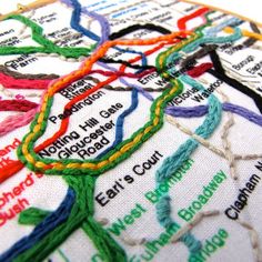 a close up of a cross stitch map