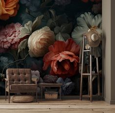 a living room with flowers painted on the wall and a chair in front of it