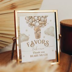 a teddy bear is sitting in a basket with pearls on it's head and the words favors take care thank you beaury much