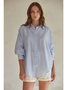 Stay cool and chic this summer with our All Day Shirt in Blue Stripe. Perfect for layering, this relaxed fit button down is the ultimate addition to your wardrobe. Embrace the summer vibes and effortlessly elevate your style. 86% Rayon, 12% Polyester, 2% Nylon