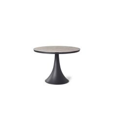 a small round table with a black base