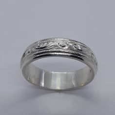 This stunning handmade/hand engraved unisex/any occasion band has been carefully crafted in solid 925 sterling silver. This beautiful band will not go unnoticed. Ring is size 9 but can be resized at no extra cost. A personalized message can be added to the inside of the ring such as your special date or any other message. All of my jewelry is handmade from scratch, one item at a time, as I like to produce a high quality piece. Ring will be shipped to you in an elegant gift box. A tracking shippi Adjustable Traditional Engraved Ring For Ceremonial Occasions, Traditional Adjustable Engraved Ring For Ceremonies, Traditional Adjustable Engraved Ring For Ceremonial Occasions, Traditional Adjustable Engraved Etched Ring, Traditional Adjustable Engraved Ring, Adjustable Traditional Engraved Etched Ring, Traditional Engraved Ring With Engraving Option, Traditional Engraved Ring For Promise, Adjustable Formal Ring With Engraving Option