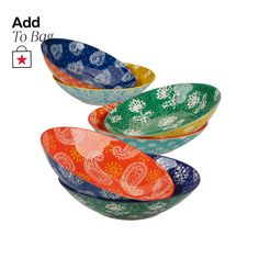 four colorful bowls with paisley designs on them