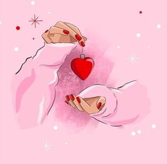 a woman's hands holding a red heart on top of pink background with snowflakes