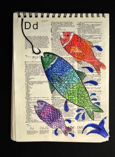 an open book with fish on it and the word dad written in blue, green, red