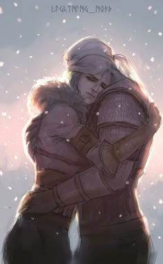 two people hugging each other in the snow