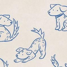 blue ink drawings of dogs and plants on white paper