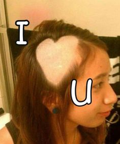 a girl with her hair in the shape of a heart and i love u written on it