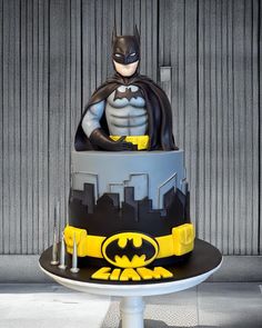 a batman themed cake on top of a table