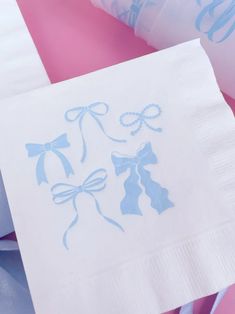 paper napkins with bows and ribbons on them