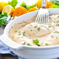 a close up of a bowl of food on a table