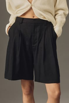 Inspired by the top-rated trousers, the Avery Shorts feature the same relaxed silhouette, chic double pleats, and flattering high rise. | The Avery Pleated Trouser Shorts by Maeve in Black, Women's, Size: 4, Linen/Viscose/Elastane at Anthropologie Suit Shorts Women Outfits, Short Trousers Outfit Women, Relaxed Fit Pleated Short Bottoms, Parisian Outfit Summer, Summer High-waisted Pleated Shorts, Slack Shorts, Black Trouser Shorts, Pleated Cotton Shorts, Trouser Shorts Outfit