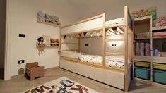 a child's bedroom with bunk beds and toys