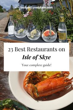 lobsters and other food on a plate with text overlay that reads, 23 best restaurants on isle of skye your complete guide