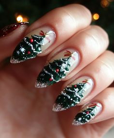 Embrace the magic of winter with these frosted white Christmas tree nails! These elegant designs feature delicate white trees, shimmering snowflakes, and icy details, perfect for a subtle yet festive holiday manicure. Ideal for those who love a minimalist winter wonderland vibe, these nails will add a frosty touch to your holiday style. Swipe through for beautiful inspiration and make your nails sparkle this Christmas! #ChristmasNails #WhiteNails #WinterNailArt #FrostedNails #NailInspo Christmas Tree Nails Acrylic, Winter Tree Nails, Shiny Christmas Nails, Xmas Tree Nails, Christmas Nails Tree, Christmas Nails Christmas Tree, Christmas Ornament Nails, Nails Christmas Tree, Snow Globe Nails