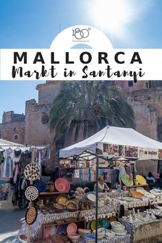 an outdoor market with palm trees in the background and text overlay that reads mallorca market in santiago