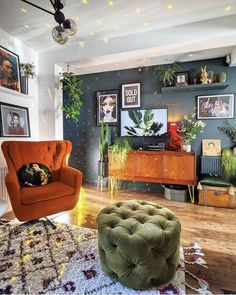 a living room filled with lots of furniture and plants on top of the walls in front of them