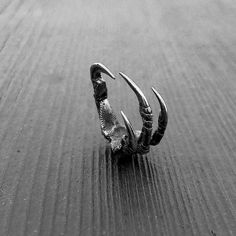 Gothic Claw Jewelry For Gifts, Gothic Claw Shaped Jewelry Gift, Gothic Claw Jewelry Gift, Gothic Claw Rings As Gift, Gothic Claw Shaped Metal Rings, Gothic Hand Cast Ring Jewelry, Elegant Claw-shaped Metal Jewelry, Hand-cast Open Ring For Jewelry Making, Hand Cast Silver Metal Rings