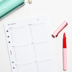 a notepad, pen, and highlighter on a white surface with the words key dates written in it