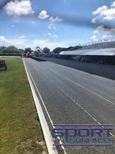 the track is empty and ready to be used for some sort of sporting event or competition