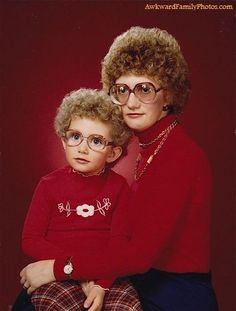 an older woman and young child wearing glasses