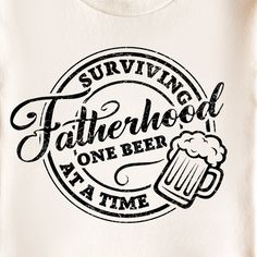 a white t - shirt with the words surviving fatherhood one beer at a time