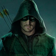 a man in green hoodie with arrows on his head and the words arrow written across it