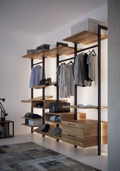 an open closet with clothes and shoes on shelves