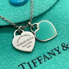 Tiffany & Co. Return To Tiffany Mini Blue Enamel Double Heart Tag Necklace 18" Length: 18 Inches Heart Tags: Mini Size Condition: Some Light Scratches; Could Benefit From A Polish, But Looks Great Overall Includes: Tiffany Pouch As Shown In Photos Blue Luxury Necklace For Valentine's Day, Luxury Blue Jewelry For Valentine's Day, Luxury Blue Heart-shaped Necklace, Elegant Blue Double Heart Necklace, Elegant Blue Heart Necklace For Mother's Day, Personalized Blue Necklaces For Valentine's Day, Personalized Blue Necklace For Valentine's Day, Blue Personalized Necklace For Valentine's Day, Blue Open Heart Necklace With Heart Charm