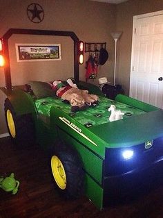 a bed made to look like a tractor