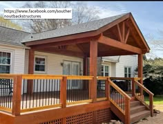 a house with a porch and covered patio