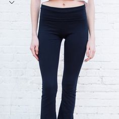 Soft Cotton Blend Yoga Pants With A Flare Pant Leg. Fabrics: 96% Cotton 4% Elastane Measurement: 12" (30 Cm) Rise, 32" (81 Cm) Inseam, 26" (66 Cm) Waist (Stretches) Made In: Europe Nwot Straight Leg Yoga Bottoms In Elastane, Fitted High-waisted Bottoms For Loungewear, Relaxed Fit Straight Leg Yoga Bottoms, Fitted High-waisted Pants For Loungewear, Blue Fitted Versatile Pants, Navy Pants For Spring Loungewear, Elastane Straight Leg Yoga Pants, Yoga Straight Leg Bottoms, Navy Relaxed Fit Bottoms For Spring