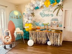 a birthday party with balloons and decorations