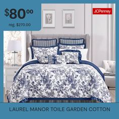 a blue and white bed in a room with the price $ 80 00 reg $ 70 00