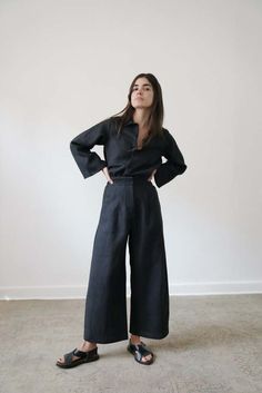 The rea pant from the classics collection is our first pant in a washed lightweight linen. masculine & feminine details are melded together in this pant to create a relaxed look by featuring wide pleats in the front and an elastic band at the back waist allowing the pants to sit high waisted. it pairs perfectly with the florence top.    - 100% linen (medium-weight)  - front pockets  - clasp + zipper closure  - model is wearing size s and is 5'6  - made in mexico 90s Minimalism, Minimalism Fashion, Closet Planning, Creative Clothing, Masculine Feminine, 2024 Style, Black Tank Dress, Clothes Closet, Winter Clothes