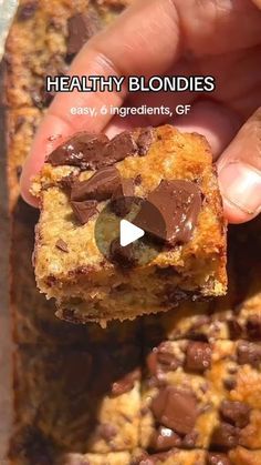 a person holding up a piece of chocolate chip cookie with the text healthy blondies easy, ingredients, gf