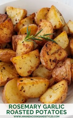 rosemary garlic roasted potatoes in a white bowl