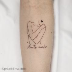 a person with a tattoo on their arm that says, amate muche in cursive writing