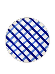 a blue and white plate on a white background with diagonal lines in the center,