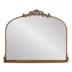 an ornate gold framed mirror on a white background