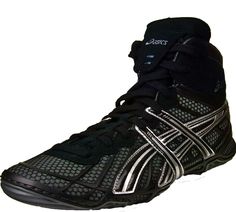 a pair of black and silver shoes on a white background with the word asics