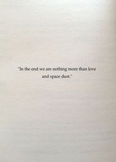 an open book with the words in the end we are nothing more than love and space dust