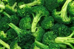 a close up view of broccoli florets in the middle of it