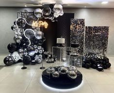 a room filled with black and white decorations