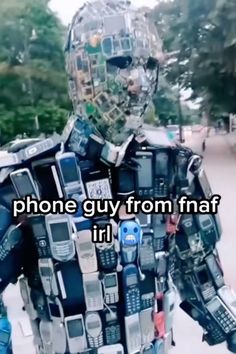 a man made out of cell phones and texting that reads phone guy from fnaf