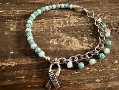 Beautiful chain teal awareness bracelet, PCOS Awareness, multi teal beads great gift for any loved one with PCOS. Comes in a gift Box. Awareness Jewelry, Awareness Bracelet, Charm Bracelets, Chain Bracelet, Jewelry Bracelets, Gift Box, Handmade Items, Great Gifts, Etsy Gift Card