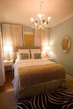 a bedroom with a leopard print bed spread