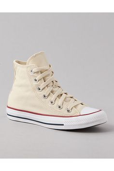 Cotton canvas upper/Round toe/Lace-up silhouette/OrthoLite cushioning/Iconic Chuck Taylor ankle patch/Diamond pattern rubber outsole Cream High-top Lace-up Sneakers With Rubber Sole, Cream Lace-up High-top Sneakers With Rubber Sole, Cream Canvas Sneakers With Laces, Cream Canvas Shoes With Laces For Streetwear, Beige High-top Canvas Sneakers With Vulcanized Sole, Beige Canvas High-top Sneakers With Vulcanized Sole, Beige High-top Canvas Sneakers, Beige Vulcanized Lace-up High-top Sneakers, Casual Beige High-top Canvas Shoes