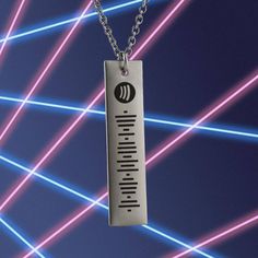 a silver necklace with an equalizer on it